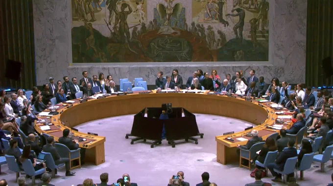 Security Council members vote on the draft resolution.