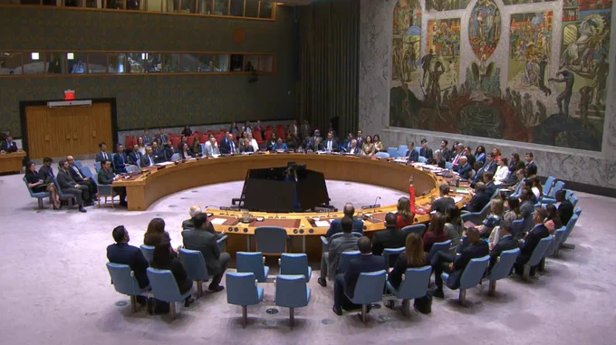 Security Council members vote on the draft resolution.