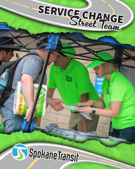 Spokane Transit Service Change Street Team in bright green shirts and hats sharing route information with riders at an outdoor booth.