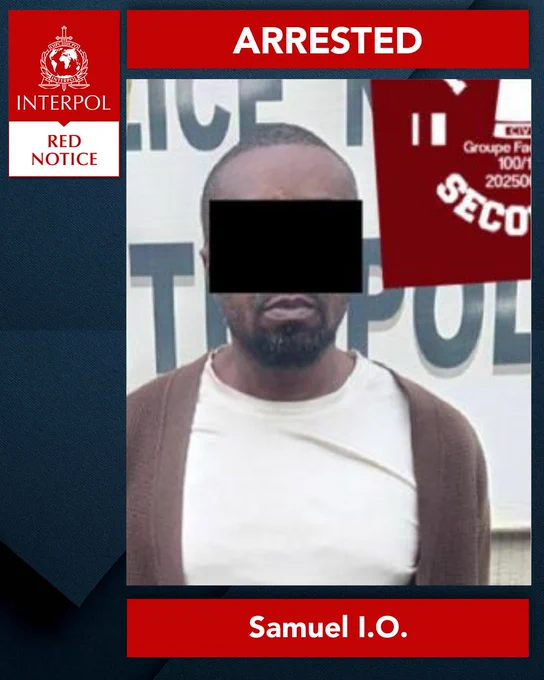 INTERPOL Red Notice poster with the word 'ARRESTED' displayed at the top. Features a photo of an individual named Samuel I.O.