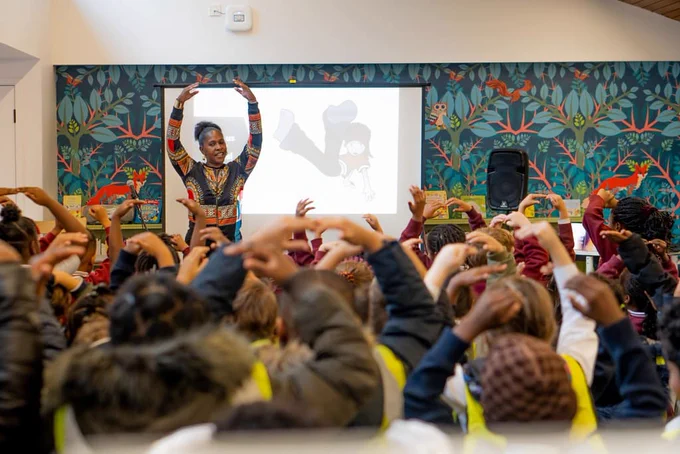 The team at Oxygen Arts hosting an event with young children.