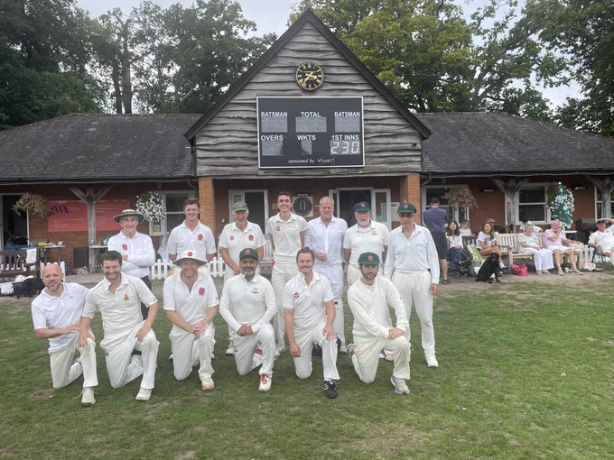 Bsuhmen team photo in front of pavilion