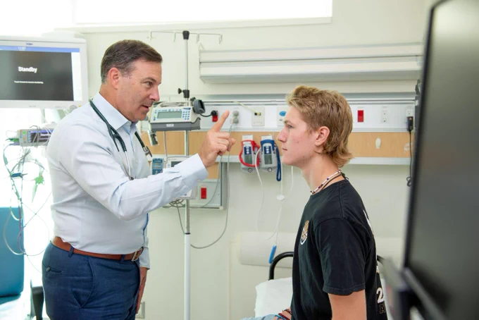 Dr. Zemek performs a concussion assessment