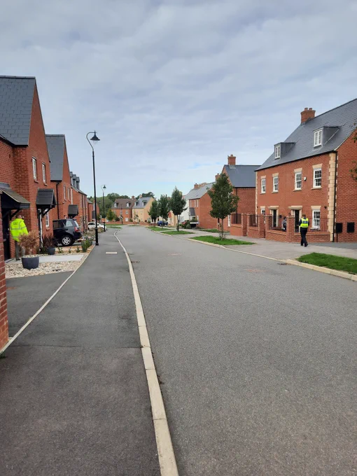 Photo of Street Watch Volunteers and a PCSO knocking doors.