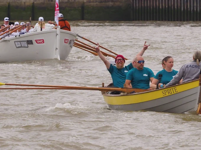 A photo of the Euan's Guide fundraisers in their rowing boat on The Thames