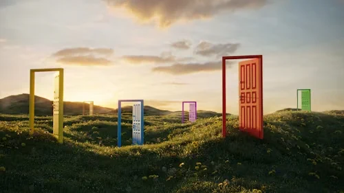 A hilly field with a set of different colored open doors.

Via https://unsplash.com/photos/multi-colored-abstract-opening-doors-on-grassy-field-on-sunny-summer-day-3d-render-8iysfoHN8BI.