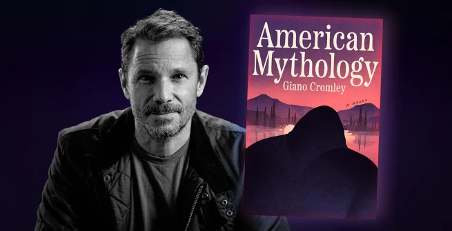 Black and white photo of author pictured with the cover of their latest book.