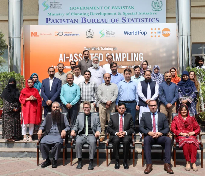 Photo of WorldPop Senior Research Fellows Dr Sarchil Qader and Dr Gianluca Boo with AI Assisted Sampling Workshop participants at the Pakistan Bureau of Statistics.