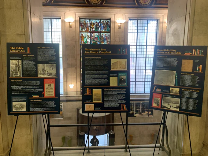 A trio of exhibition boards at Manchester Central Library.