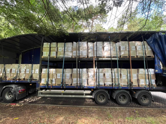Heavy goods vehicle with straps securely holding down each pallet load as per DVSA guidance