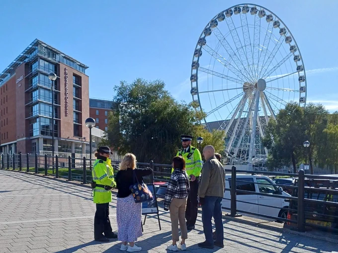 Project Servator officers speaking with members of the public at Keel Wharf, near the M&S Bank Arena.