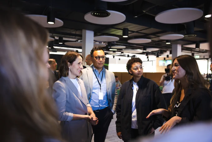 Technology Secretary, Liz Kendall (left), speaking with apprentices at Sage offices