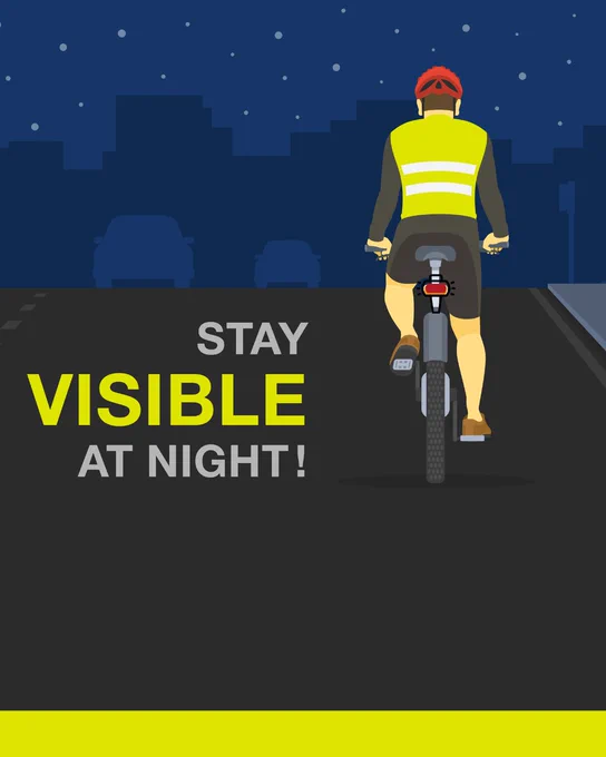 An illustration of a person cycling at night, wearing a reflective vest and a helmet, with the text 'Stay Visible at Night!' displayed.