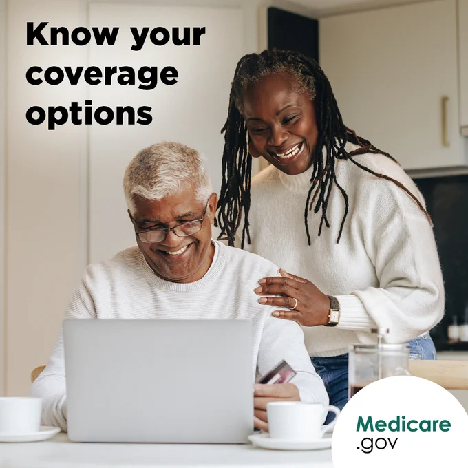 A photo of an older couple, with the older man seated at a kitchen counter with a coffee cup next to him and the older woman standing over his shoulder, use a laptop in their kitchen. Overlay text: Know your coverage options.
