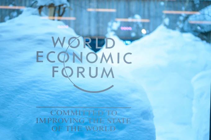 World economic forum logo with the slogan committed to improving the state of the world beneath it. 