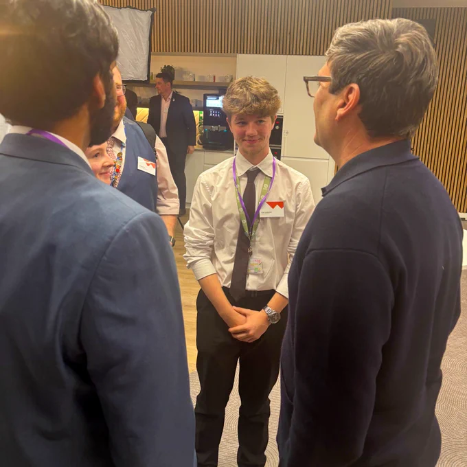 Andy Burnham chats to three Laurus Ryecroft Sixth Form Students