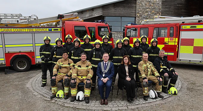 Cathaoirleach of Cavan County Council Cllr John Paul Feeley and Cavan County Council Head of Finance and Emergency Services Margaret McNally are pictured with a group firefighters from across County Cavan who have completed a QQI Level 6 Pump Operators' course at Castle Saunderson International Scouting Centre. They are pictured in front of two fire engines. The firefighters are wearing full fire kit. 

Pictured are (Front) from left Ray Slaughter, Instructor; Martin Trainor, Senior Assistant Chief Fire Officer and Course Director; Cathaoirleach Cllr John Paul Feeley, Margaret McNally, Head of Finance & Emergency Services, Cavan County Council, Liam McGovern, Instructor & Eamon Mulcahy, Instructor. (middle from left) Don McAvenue, Darragh Tighe, Aaron Pickens, Rory McPartland, Aaron Brady & Colin McGovern. (back from left) Pat Gillick, Paul McDonagh, Lorcan Duffy, Martens Nowak, Sean Rooney & Seamus Cooney.  Photo: Lorraine Teevan