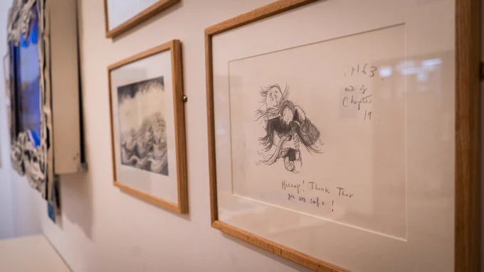 Original artwork framed on wall