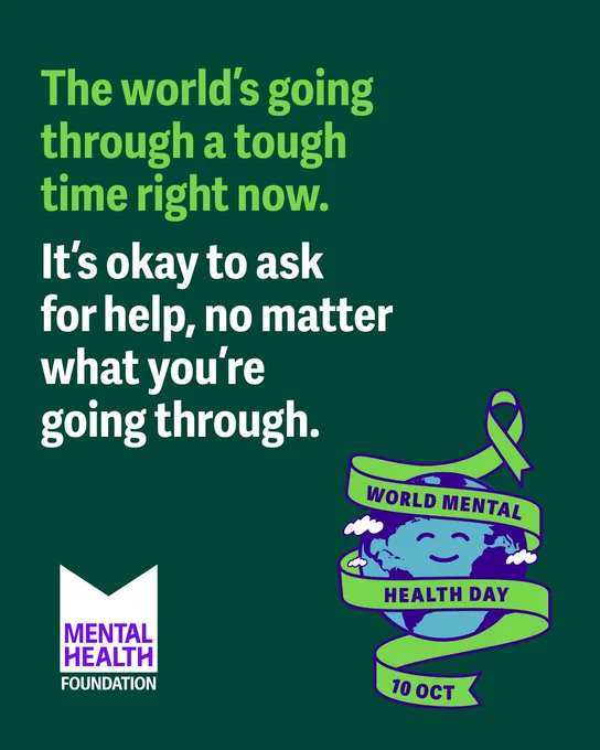 The image features a dark green background with text in two colors. In light green, "The world’s going through a tough time right now." In white, "It’s okay to ask for help, no matter what you’re going through." On the bottom left is the Mental Health Foundation logo. On the right is a smiling globe wrapped in a green ribbon with text: "World Mental Health Day 10 Oct," accompanied by a green awareness ribbon.