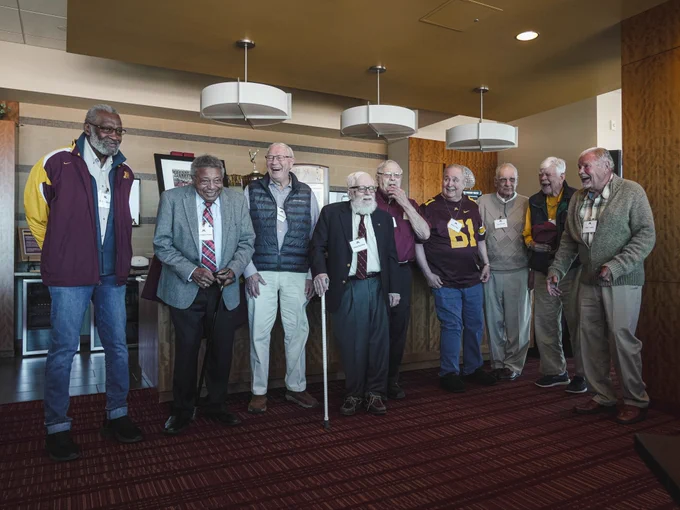 The 1960 National Championship team at Huntington Bank Stadium in 2025.