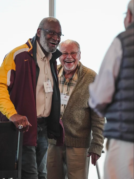 Members of the 1960 National Championship football team from Minnesota at Huntington Bank Stadium in 2025.