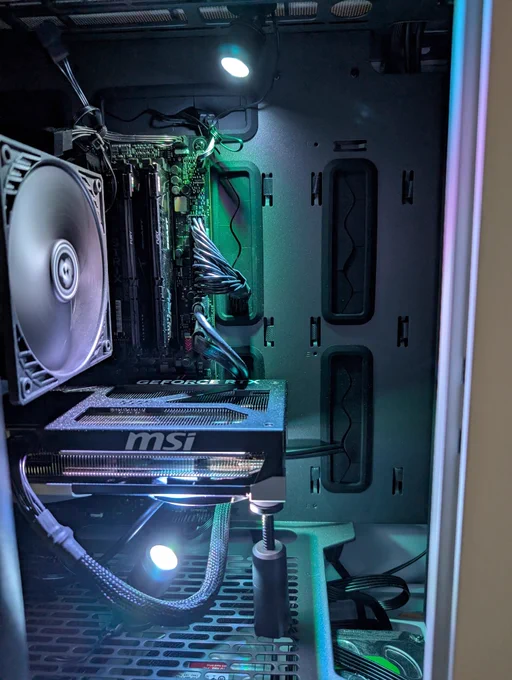 The inside of my PC case, showing two led spots illuminating up and down respectively.