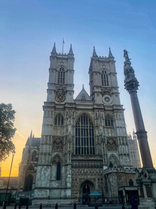 The west front of Westminster Abbey at sunrise.