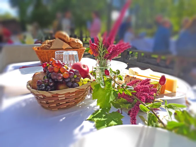 Fruit and flower colourful table arrangement