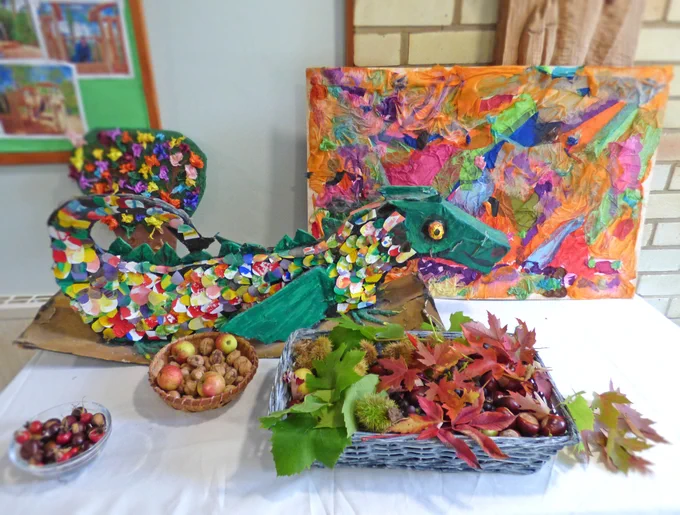Fruit, flower and artwork dragon colourful table arrangement