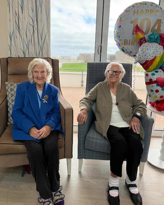 Nancy with her friend blind veteran Win, 98, at the celebration.