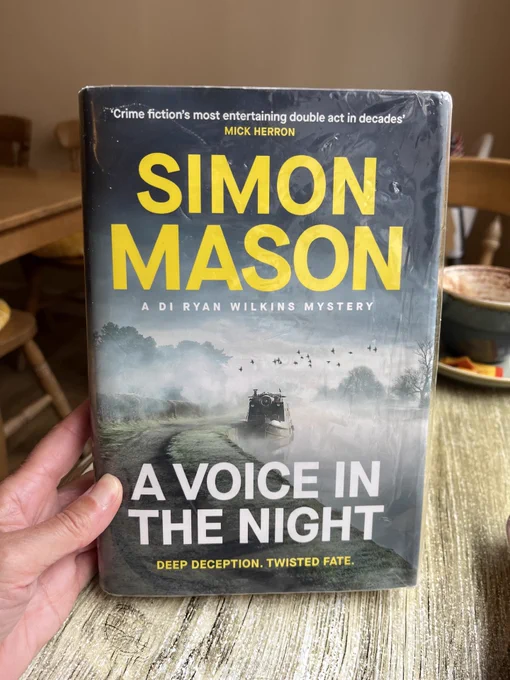 Photo of the front cover of a booked entitled "A Voice in the Night" by Simon Mason