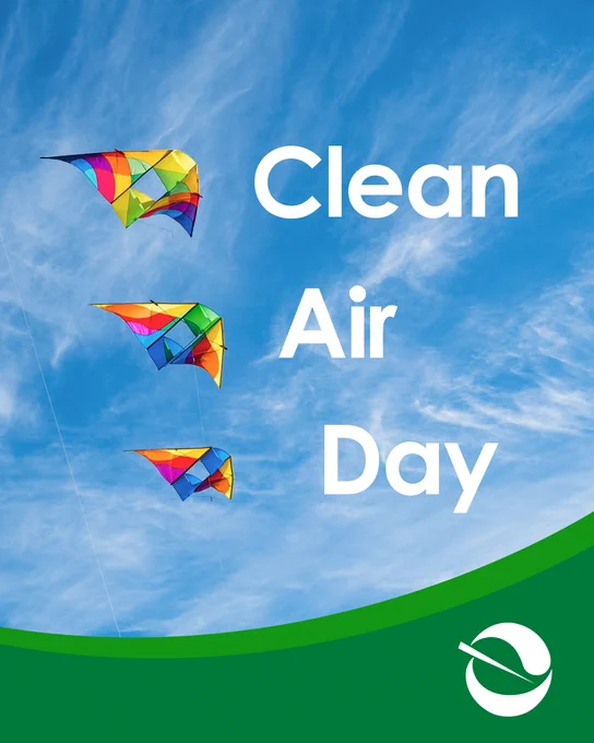 A blue sky with clouds and kites with text overlay reading Clean Air Day