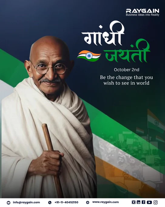 Raygain Gandhi Jayanti tribute poster featuring Mahatma Gandhi with folded hands against a tricolor background, text ‘गांधी जयंती – October 2nd – Be the change that you wish to see in the world.’ Raygain logo and contact details at the bottom.