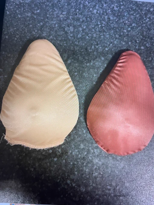 A model set of a brown a white breast are shown