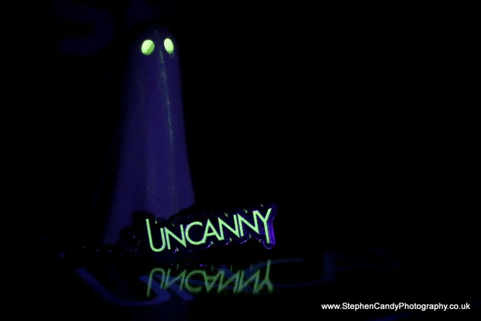 Glow in the dark Uncanny keyring, on the "Fear of the Dark" programme with a York Ghost (also glowing.)