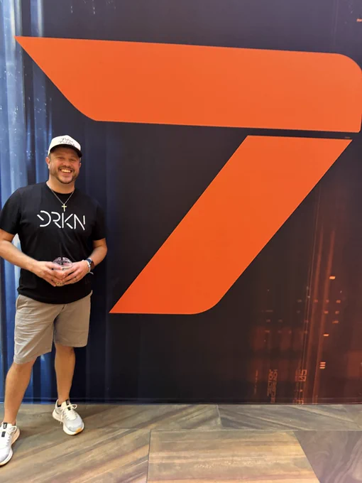 Dex standing in front of the Call of Duty Black Ops 7 logo at CODNext.