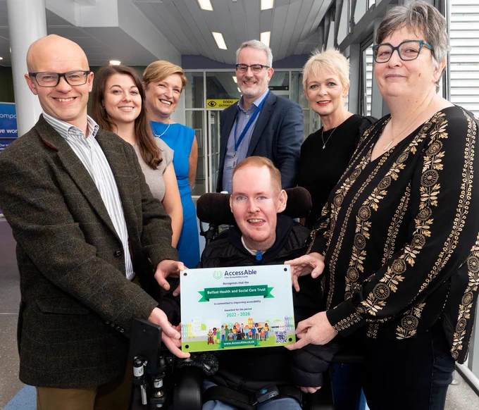 Pictured (Left to Right) 
Alistair Campbell Director of Performance, Planning & Informatics, Belfast Trust, Ellen Ilot from AccessAble, Orla Barron, Interim Co-Director of Planning and Equality, Belfast Trust, David Porter, Director of Strategic Development, Belfast Trust, patient and service user Conor O'Kane, Estella Dorrian, Senior Equality and Planning Manager, Belfast Trust, and Siobhan O'Kane, Conor's mum. 
