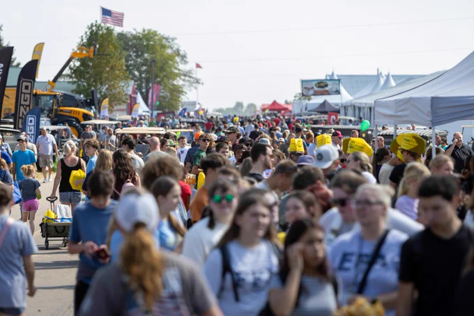A large crowd fills the main street at Farm Science Review 2025, showing the strong turnout of more than 112,000 visitors.