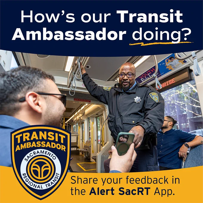 A Sacramento Transit Ambassador smiling on a train as a passenger shows something on a phone. Text encourages feedback via the Alert SacRT App.
