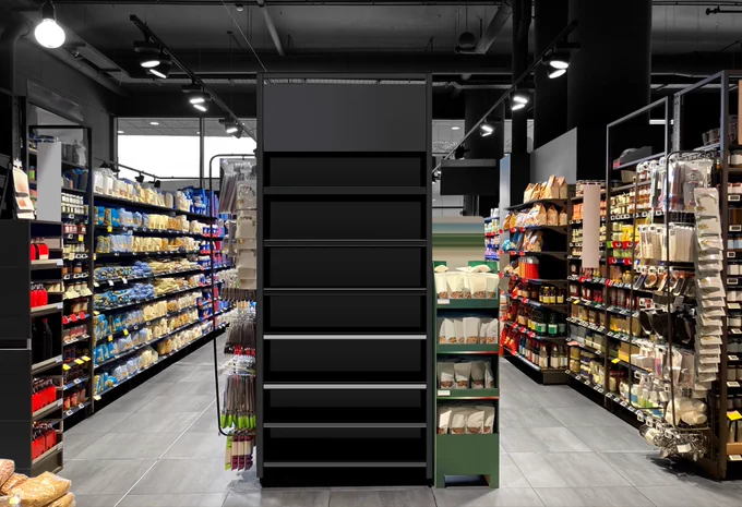 Modern supermarket aisle with a clean and organized layout. The central black shelving unit is completely empty, framed by stocked shelves on both sides filled with colorful packaged goods, pasta, sauces, and everyday essentials. Bright lighting and polished gray flooring give it a sleek, contemporary retail look.

https://stock.adobe.com/contributor/211338080/Whatson

#SupermarketDesign #RetailAisle #StoreLayout #ModernRetail #Planogram #ShelfDesign #VisualMerchandising #RetailInspiration #EmptyShelves #GroceryStore