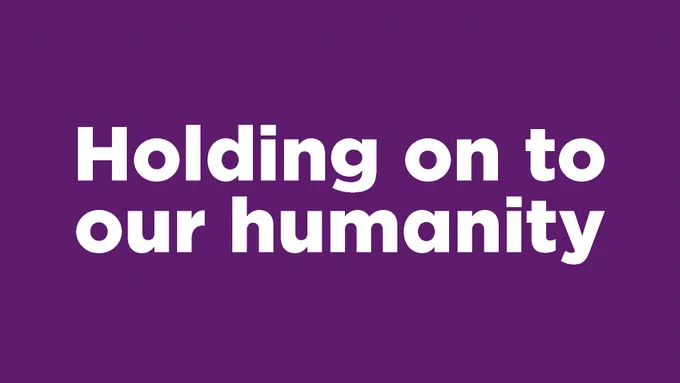 Holding on to our humanity written in bold white text on a purple background