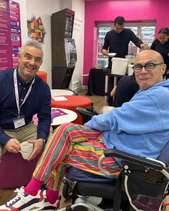Two trustees, Carl & Paul smiling for a posed photo.

