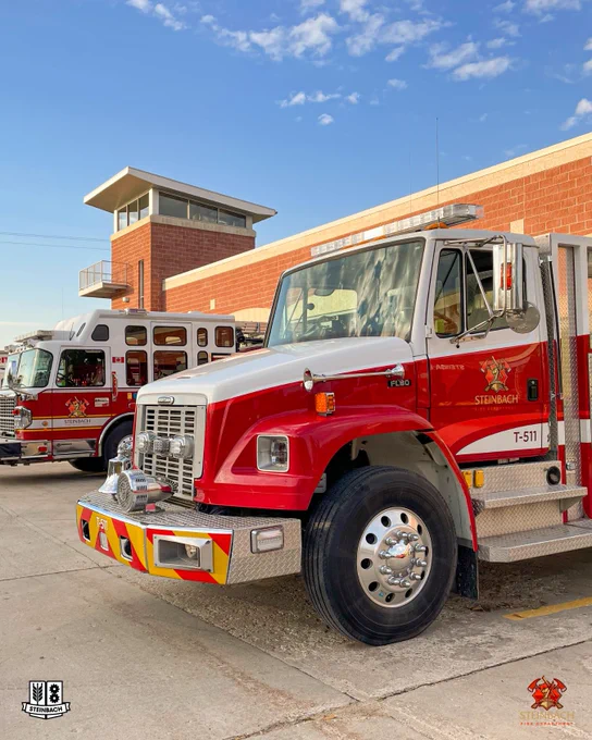 Steinbach Fire Department trucks lined up in front of the Steinbach Fire Hall.
