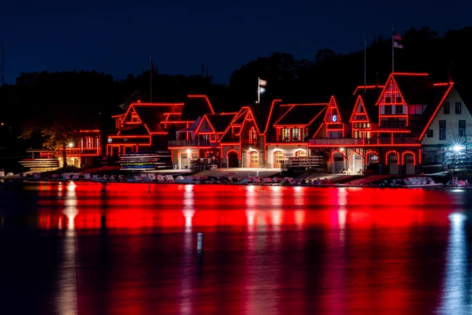 Photo of Boat House row lit up red for Red October