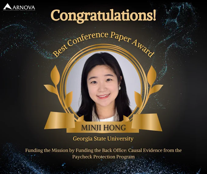 A gold and black congratulatory graphic featuring Minji Hong, recipient of the 2025 ARNOVA Best Conference Paper Award, with the title Funding the Mission by Funding the Back Office: Causal Evidence from the Paycheck Protection Program.
