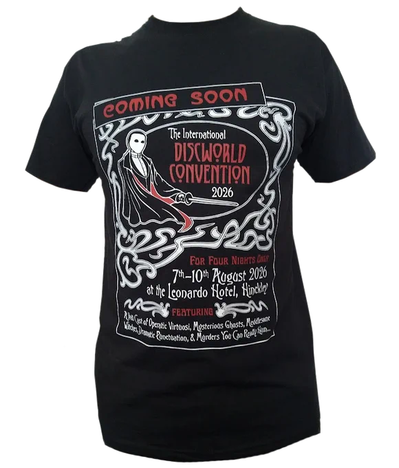 A photograph of a black unisex fit t-shirt with the design for the 2026 International Discworld Convention printed on the front in white and red.