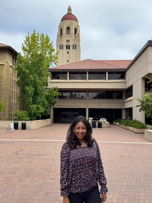 Nabila in front of the Cecil H. Green Library on the Stanford campus
