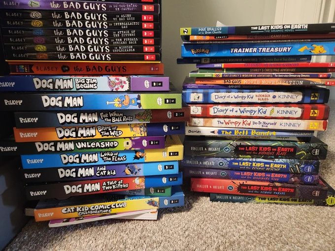batch of books to donate to a teacher...mostly around 4th grade level (Bad Guys, Dog Man, Wimpy Kid, Last Kids on Earth)