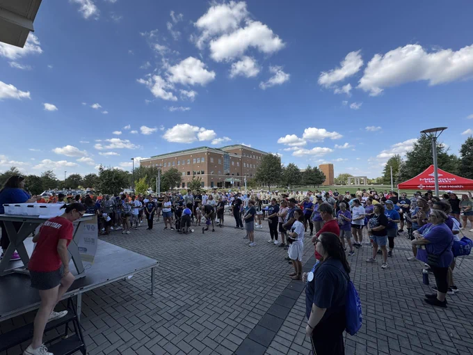 Speaker addressing all those involved in the walk.