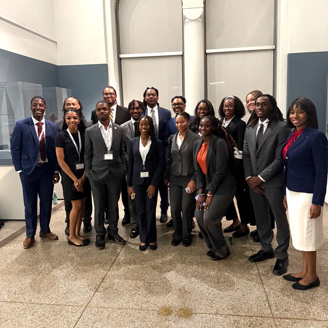 [From left to right: Chandler Lilly, Aldous Blackwell, Sydney Friley, Zion Hackney, Hudson Taylor, Syrus Chivers, Aliya Crawley, Joseph Stuckey V, Derek Holloman, Candace Harrison, Jinelle Brewster, Adrianna Thomas, Adriana Clanton,  Nyla Williams, Noah Morgan, Faculty Adviser and Assistant Professor Inger Daniels-Hollar]